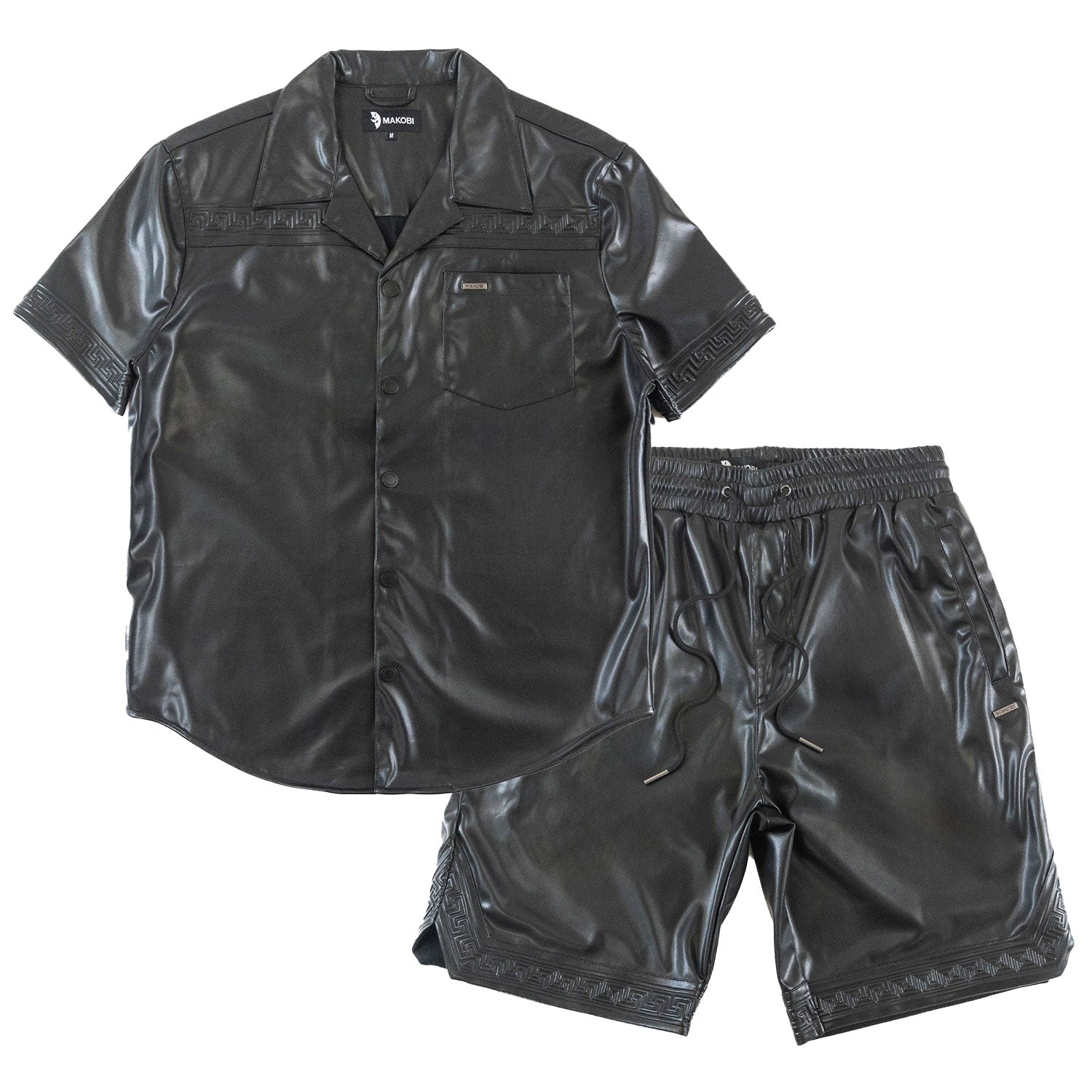 Black shiny shirt and shorts set on a white background